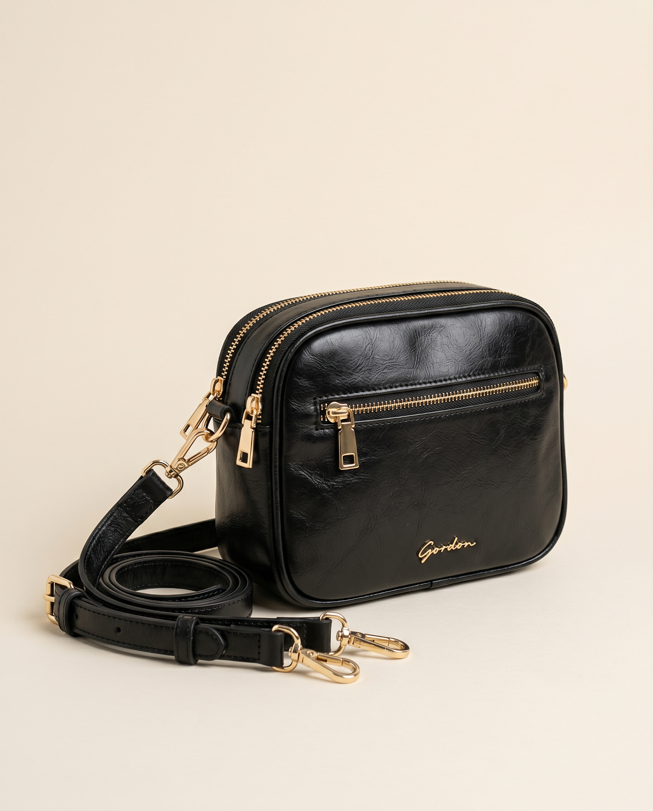 Black Multi-Zip Crossbody Bag with Gold Hardware